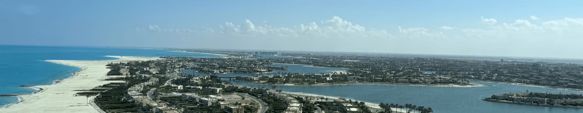 Banner image with a view of the coastal landscape of New Alamein for the EBS case study of the Arab Academy